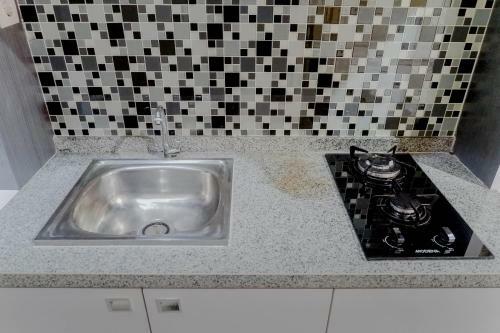 Relaxing Studio Apartment At Tamansari Papilio By Travelio