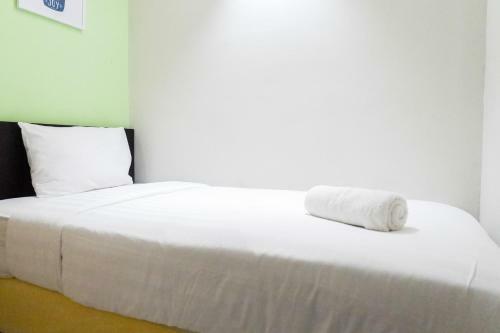 Cozy 2br Apartement At Dian Regency By Travelio