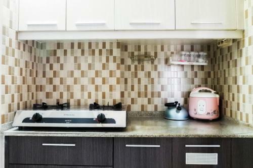 Cozy 2br Apartement At Dian Regency By Travelio