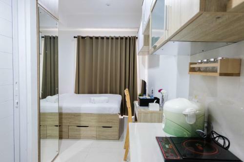 Elegant Studio Apartment At Springwood Residence By Travelio