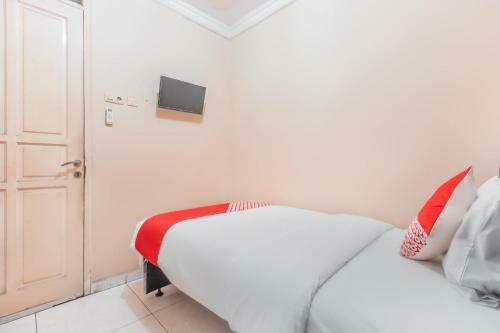 Hotel Oyo 2765 Mulia Raja Kost
