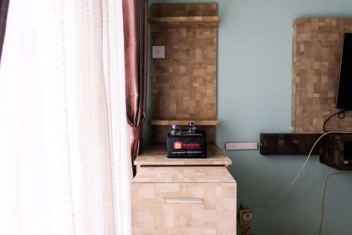 Minimalist Studio At Serpong Greenview Apartment By Travelio