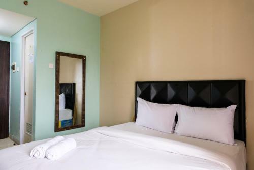 Minimalist Studio At Serpong Greenview Apartment By Travelio