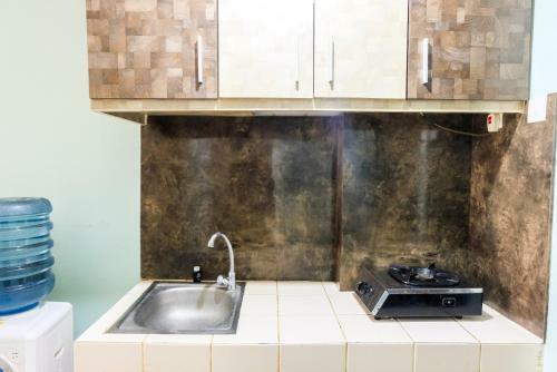 Minimalist Studio At Serpong Greenview Apartment By Travelio