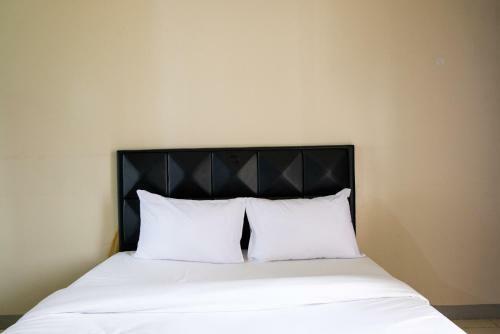 Minimalist Studio At Serpong Greenview Apartment By Travelio