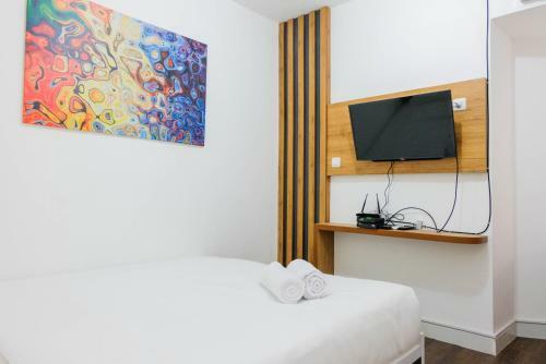 Minimalist Studio Apartment At Aeropolis Residence By Travelio
