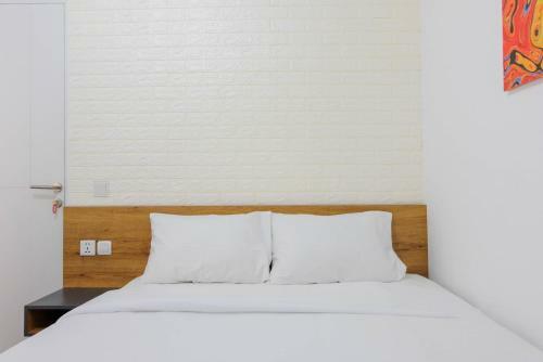 Minimalist Studio Apartment At Aeropolis Residence By Travelio