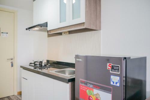Strategic Studio Apartment With Extra Bed At M-town Residence By Travelio