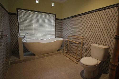 Hostal Bayu House And Villas