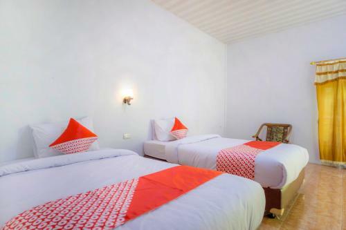 Hotel Oyo 2186 Tongging Beach