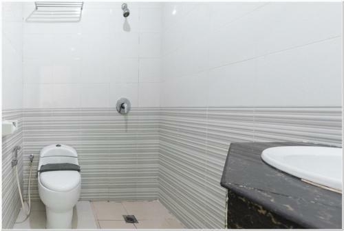 Hotel Reddoorz Plus @ Hertasning Area
