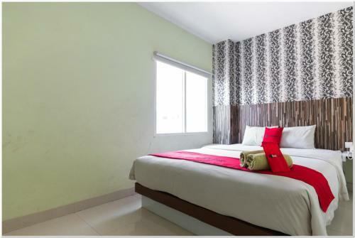 Hotel Reddoorz Plus @ Hertasning Area