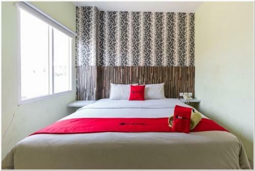 Hotel Reddoorz Plus @ Hertasning Area