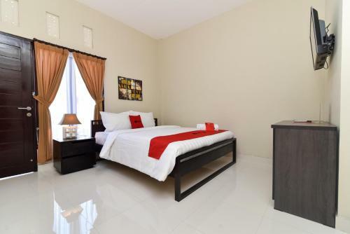 Hostal Reddoorz Plus Near Jalan Imam Bonjol Denpasar