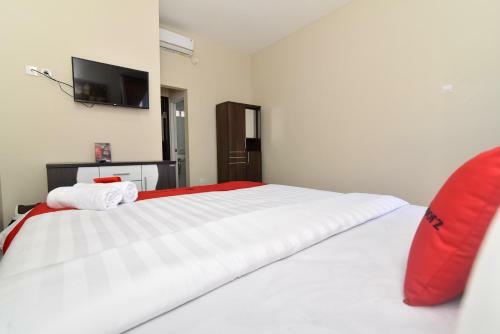 Hostal Reddoorz Plus Near Jalan Imam Bonjol Denpasar