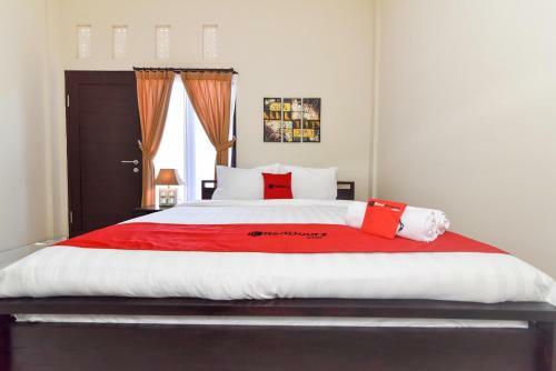 Hostal Reddoorz Plus Near Jalan Imam Bonjol Denpasar
