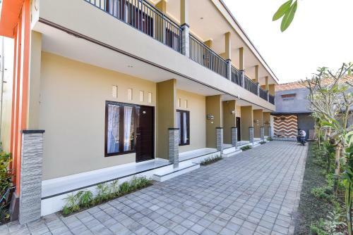 Hostal Reddoorz Plus Near Jalan Imam Bonjol Denpasar