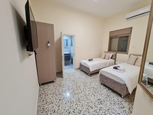 Apartamento Rizik's Guest House