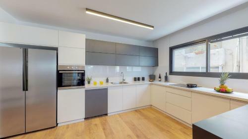 Apartamento Perfect 4br In Frishman By Holyguest
