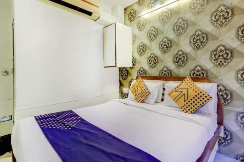 Spot On 46850 Hotel As-ray