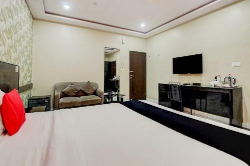 Hotel Capital O 74741 Green Woods Premium Suites