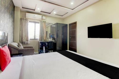 Hotel Capital O 74741 Green Woods Premium Suites