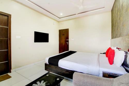 Hotel Capital O 74741 Green Woods Premium Suites