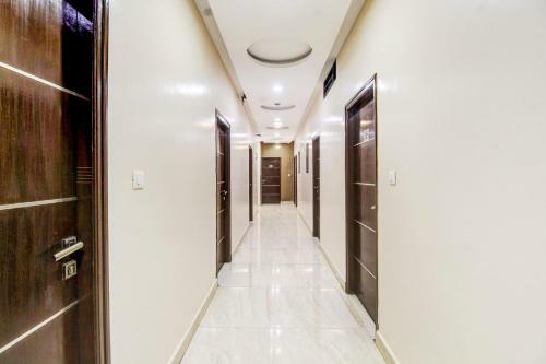Hotel Capital O 74741 Green Woods Premium Suites