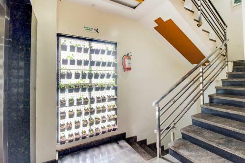 Hotel Capital O 74741 Green Woods Premium Suites