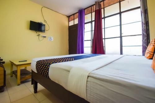 Spot On 65964 Hotel Amar