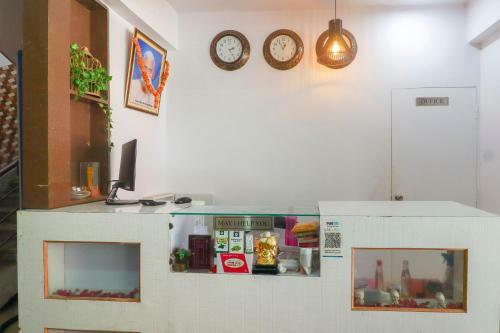 Capital O74648 Vinayaka Hotel