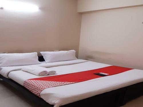 Hotel Oyo 80437 Aig Heights