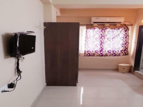 Hotel Oyo 80437 Aig Heights