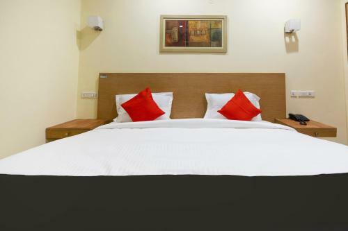 Hotel Capital O 67372 Garuda Suites