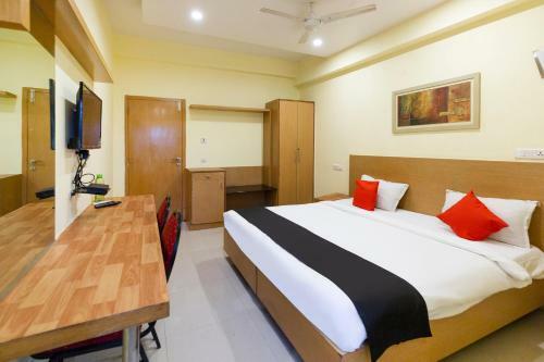 Hotel Capital O 67372 Garuda Suites