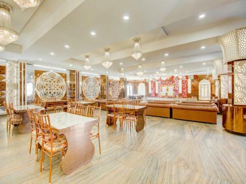 Hotel Capital O 77560 Oak Tree By Golden Plate