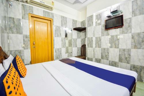 Spot On 68349 Kaka Hotel