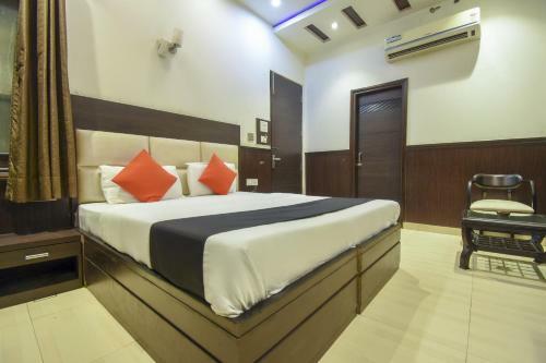 Capital O74375 Hotel Grand Plaza