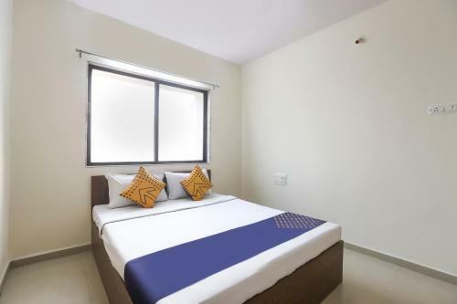 Spot On 64910 Varma Imperial Hotel