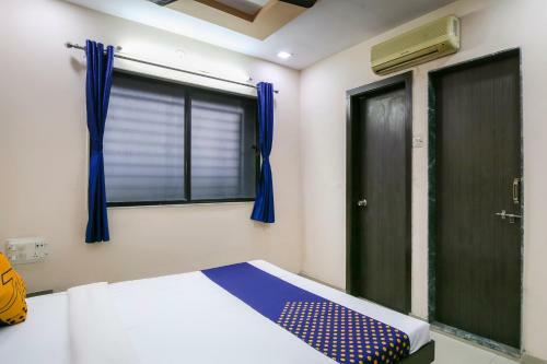 Spot On 64910 Varma Imperial Hotel