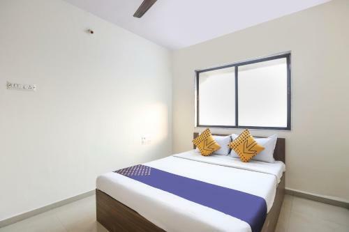 Spot On 64910 Varma Imperial Hotel