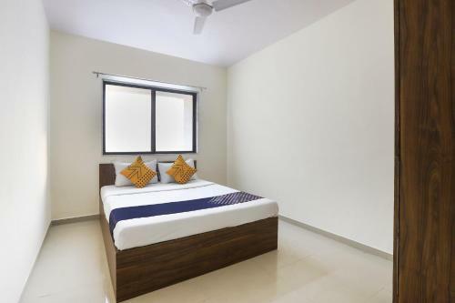 Spot On 64910 Varma Imperial Hotel