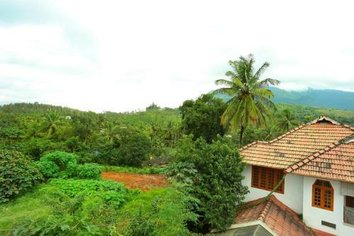 Hostal Oyo 77920 Heavenly Wayanad