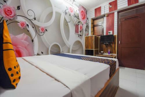 Spot On 75417 Hotel Adesh