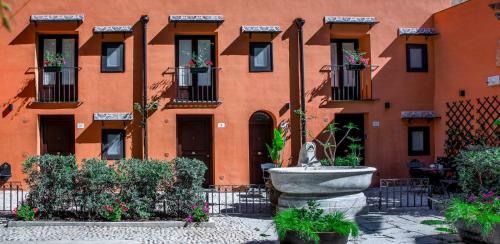 Le Casette Palazzo Ajutamicristo