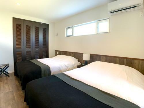 Apartamento Tsukasa Condo Chatan Alaha