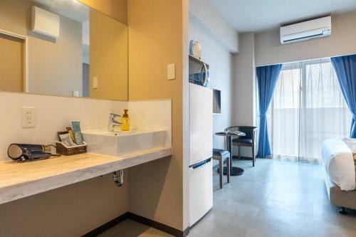 Apartamento Mr.kinjo In Grand Blue Chatan