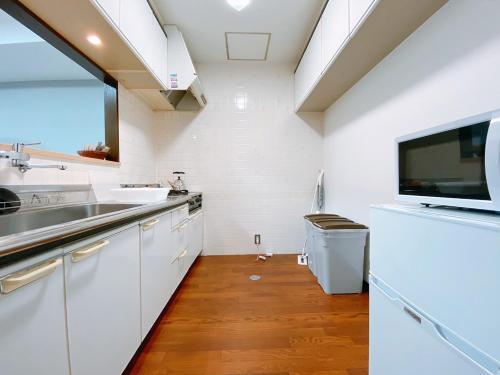 Apartamentos Ouchi Hotel Itsukaichi
