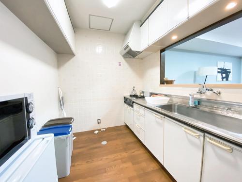 Apartamentos Ouchi Hotel Itsukaichi