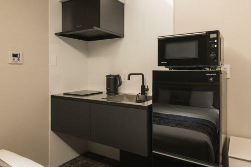 Apartamento Grand Base Kagoshima Tenmonkan